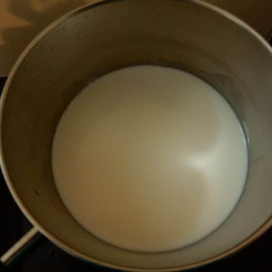 milk in a pot before putting into the oven for drying. 