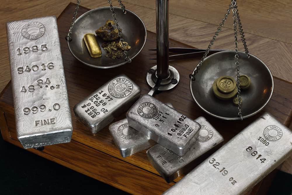 Gold and Silver Bullion on Antique Balance Scale